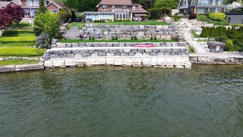 Aerial view of a terraced armour-stone shoreline